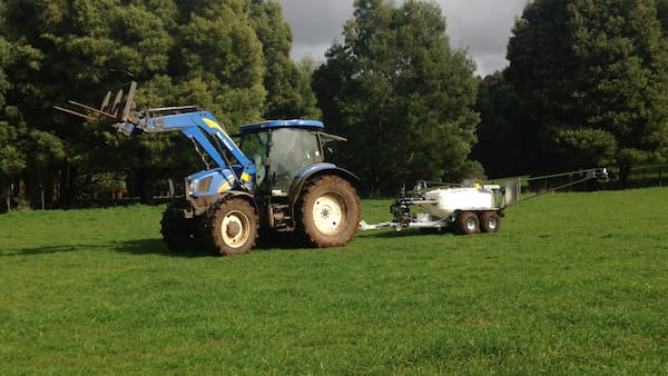 Applying liquid fertiliser to pasture.