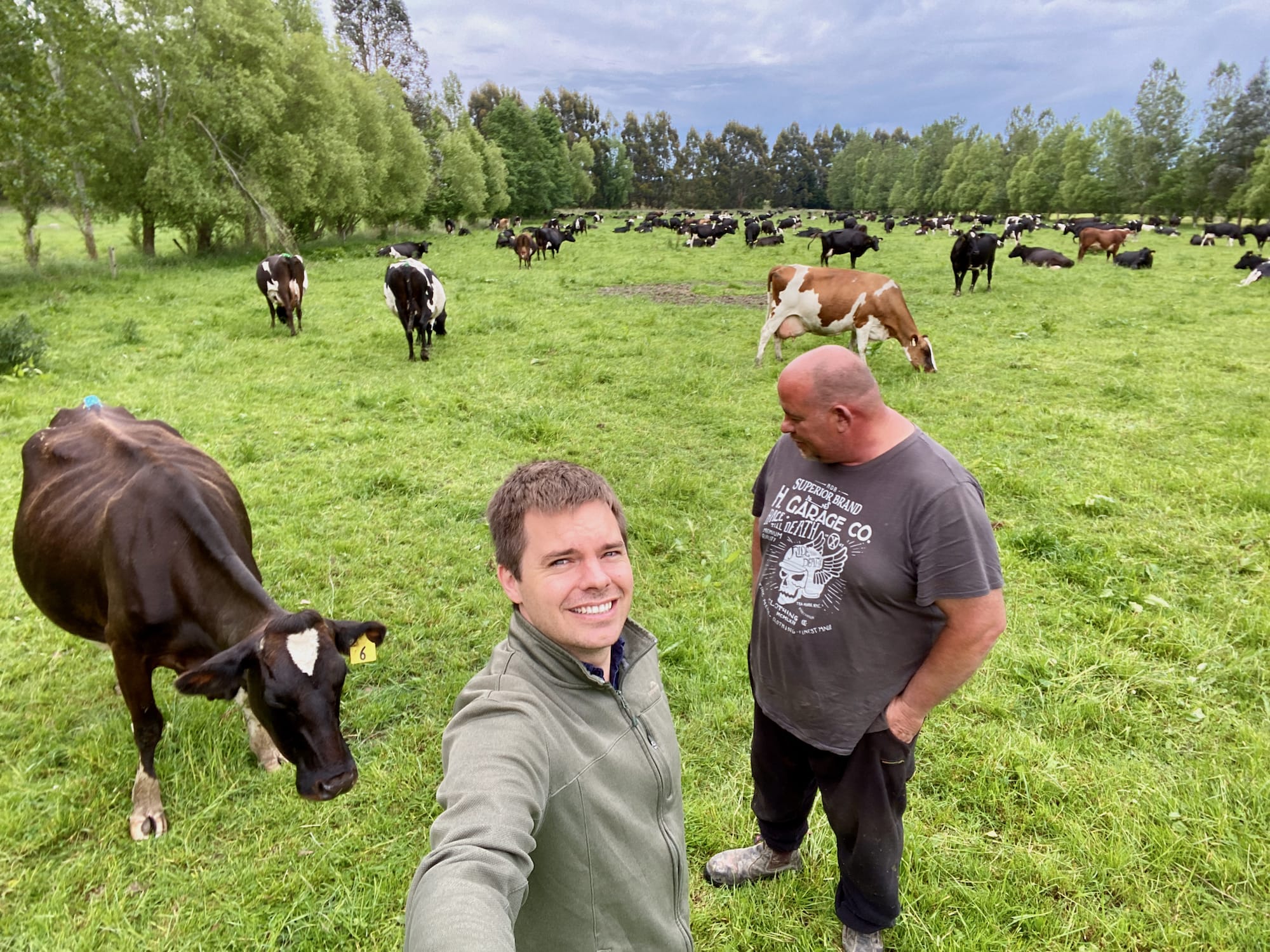 John Thornley and Ollie Roberts in the paddock on the farm at Telford Dairy